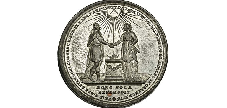 Medaillon mit zwei Personen, die sich die Hand geben; strahlendes Auge und Pyramide darüber.